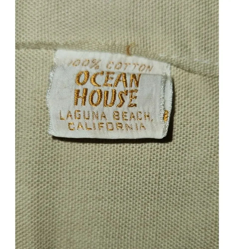 Ocean House yellow logo